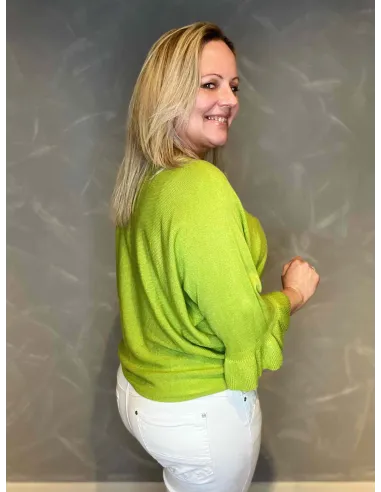 let sommerstrik i lime, med klokkeærmer, vist bagfra