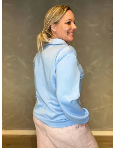 Polokrave og ærmeafslutning på sky blue LA sweatshirt, vist bagfra