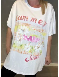 "Nærbillede af Summer Cloud print med blomster og farverige detaljer"
