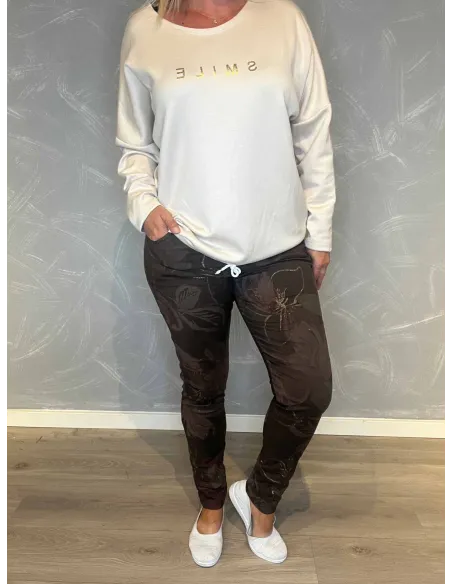 "Brun strækbukser med blomsterprint og guld detaljer til kvinder - Italian Select"