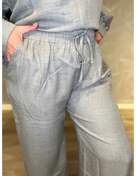 "Nærbillede af elastik og sidelommer på grå catwalk vige bukser til kvinder - TIPPY"