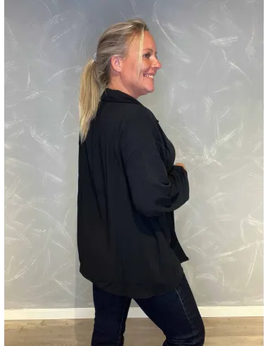 "Bagside af sort tunika med afslappet pasform"