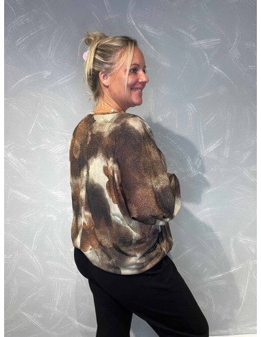 "Bagside af bluse med batik print og elastik forneden"