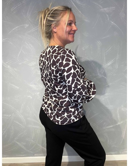 "Bagside af bluse med giraffe print"