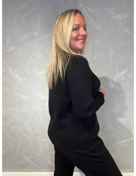 "Bagside af cardigan med rib-struktur"