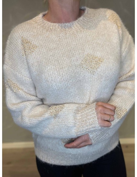 "Nærbillede af gulddetaljer på beige strik til kvinder - TIPPY"