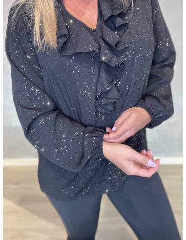 Flæsedetalje og glimmereffekt på sort bluse – TIPPY