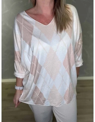 Harlekin ternet mønster på beige strik – TIPPY