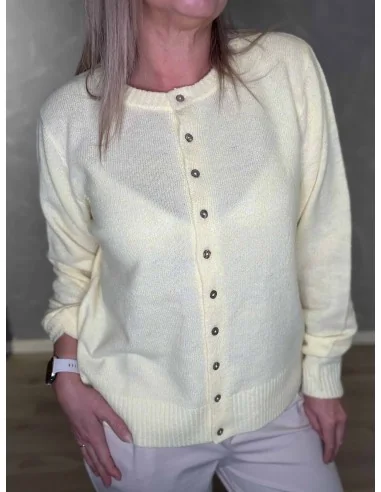 Knaplukning og ribkanter på gul strik cardigan – TIPPY