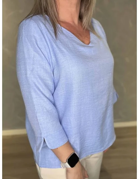 “Nærbillede af let kvalitet på bluse – TIPPY