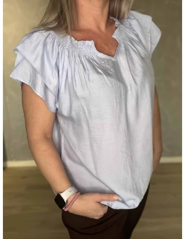 Nærbillede af frynse ærmer på bluse – TIPPY