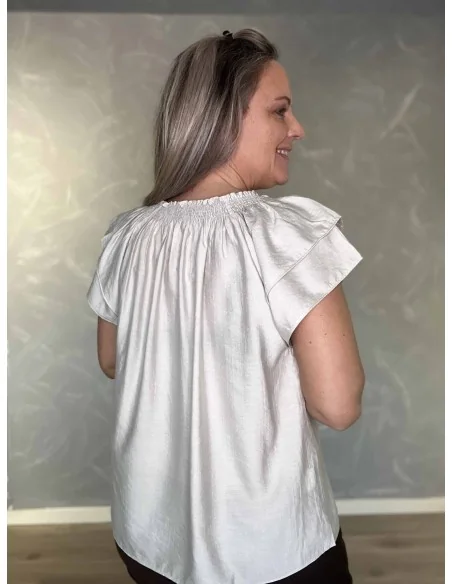 Bagside af beige bluse til kvinder – TIPPY