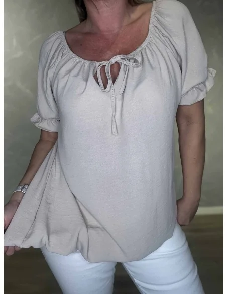 Nærbillede af elastikbund på bluse – TIPPY