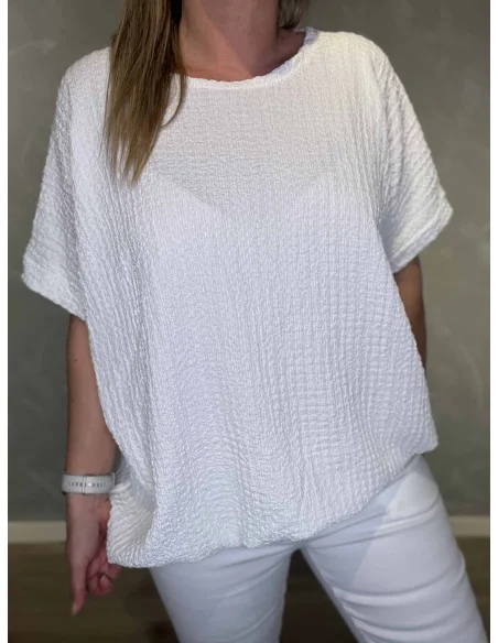 Nærbillede af struktur på bluse – TIPPY