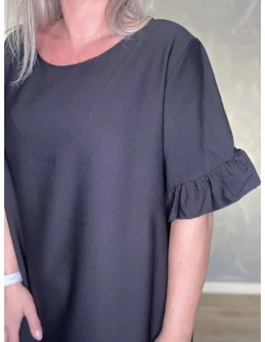 Nærbillede af flæse på ærmer på kjole – TIPPY