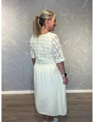 Bagside af gul kjole med blonde overdel – TIPPY