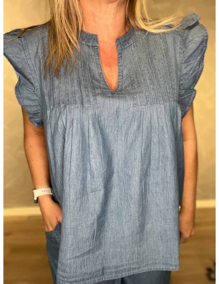 Nærbillede af flæseærmer på bomuldsbluse – TIPPY