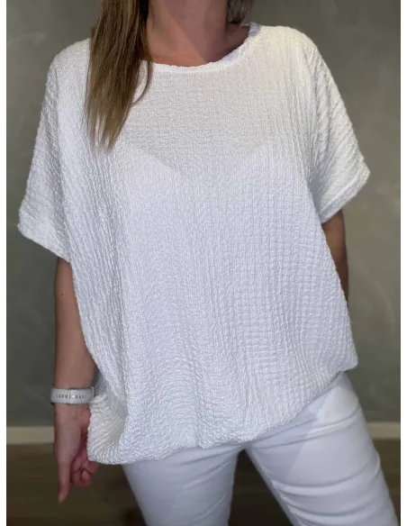 Nærbillede af struktur på bluse – TIPPY