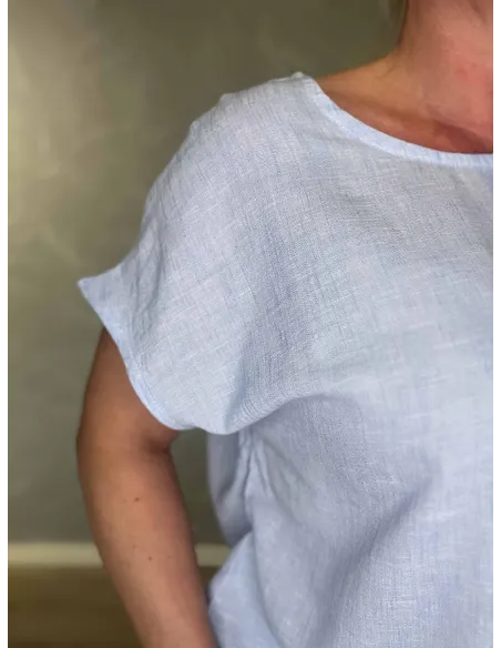 Nærbillede af sky melange stof på box T-shirt – TIPPY