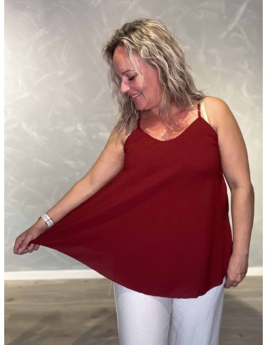 Nærbillede af a facon på polyester og elastan top – TIPPY