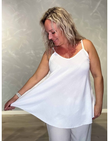 Nærbillede af a facon på polyester og elastan top – TIPPY