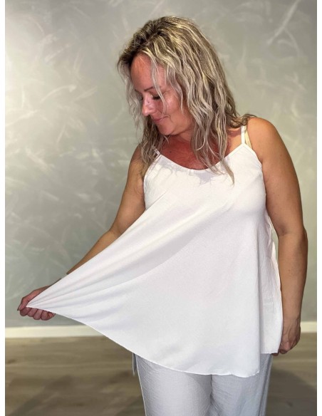 Nærbillede af a faconpå polyester og elastan top – TIPPY