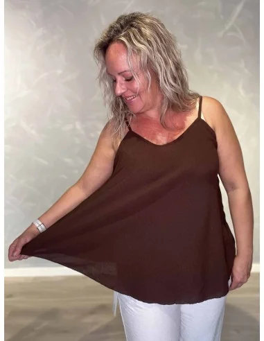 Nærbillede af a facon på polyester og elastan top – TIPPY