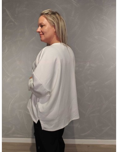 Bagside af hvid oversize bluse til kvinder – TIPPY