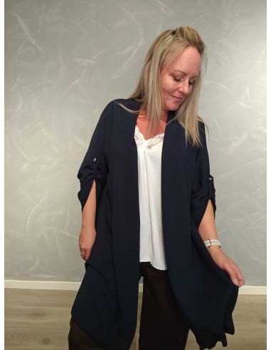 Nærbillede af det lette materiale på navy cardigan – TIPPY