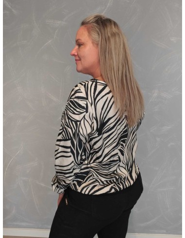 Bagside af sort-hvid bluse med zebraprint til kvinder – TIPPY
