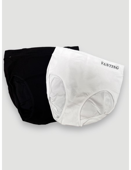 Nærbillede af materialekvalitet og elastiske kanter på sort shape wear trusse