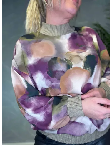 Detalje af strik i guldglimmer på chiffon bluse – TIPPY