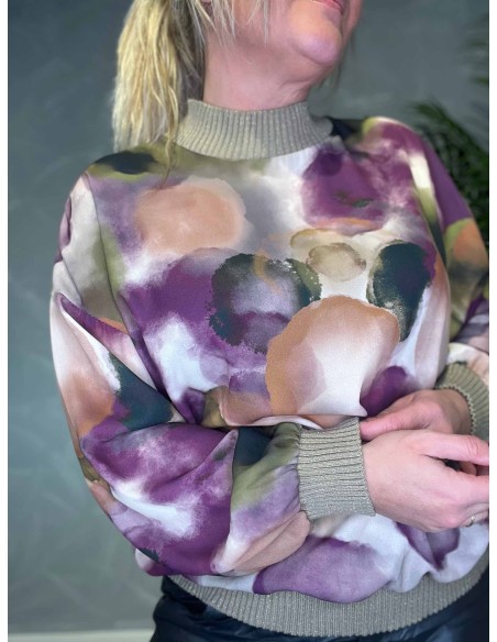 Detalje af strik i guldglimmer på chiffon bluse – TIPPY