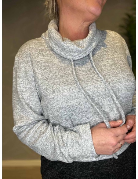 Detalje af ærmer med bred hem